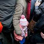 Москвичи несут цветы к месту убийства Бориса Немцова